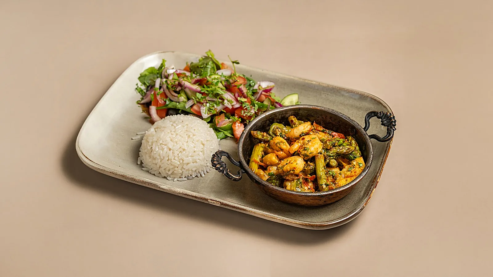 Prawns sautéed with asparagus, rice and salad at Konak Meze